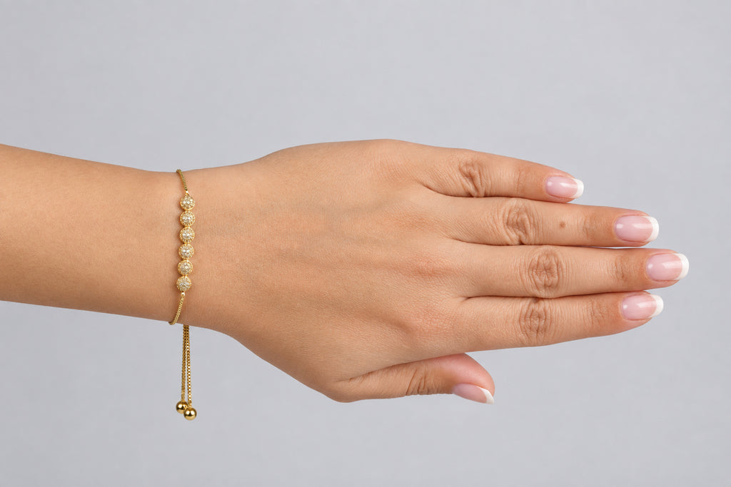 Six textured- bead adjustable bolo bracelet 18K gold finish