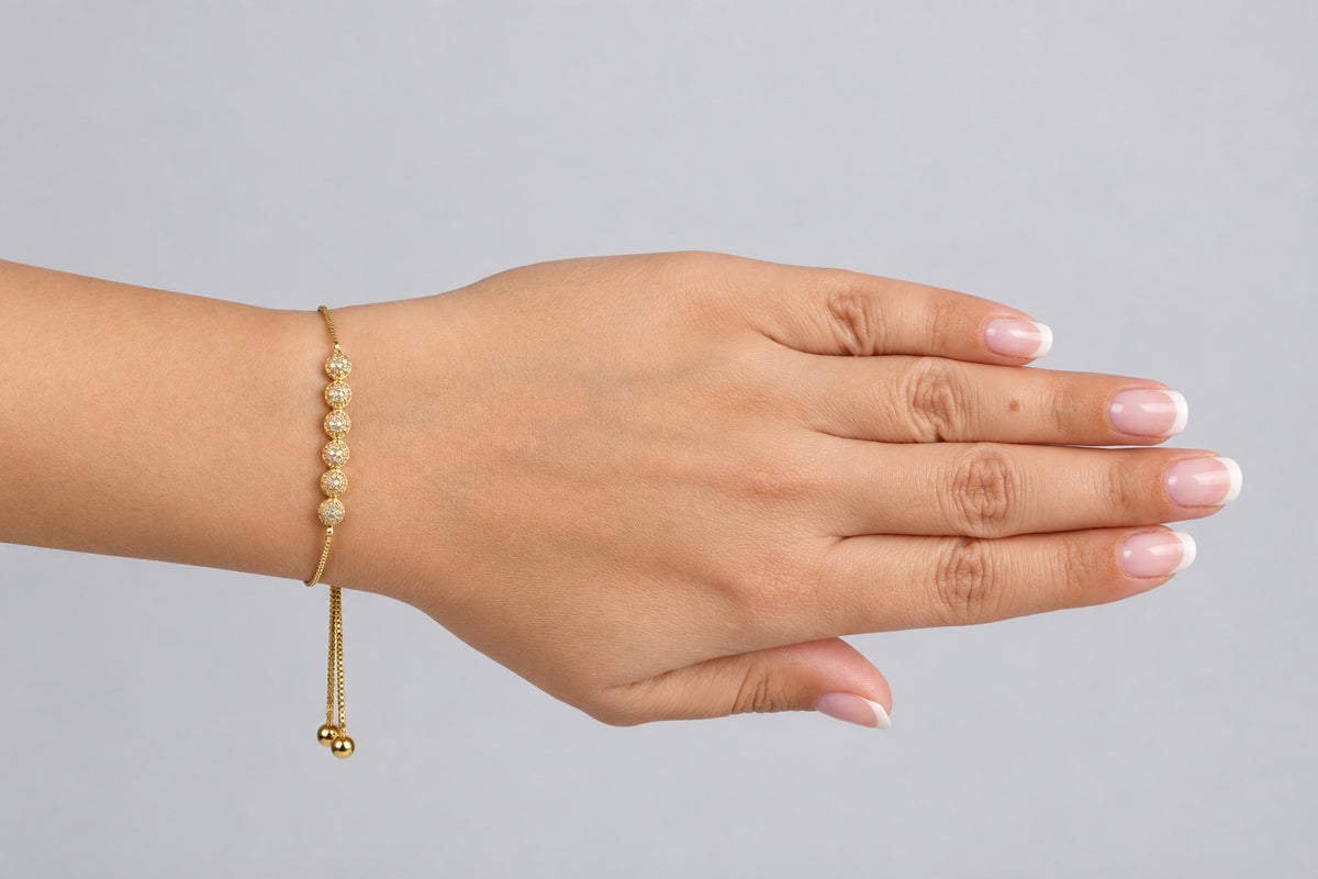 Six textured- bead adjustable bolo bracelet 18K gold finish