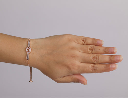 Double-heart motif set with Shimmeing Accents 18K rose Gold Finish